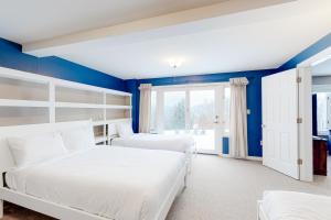 Campton White Mountains Retreat客房内的一张或多张床位