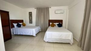 My Home Hotel Punta Cana客房内的一张或多张床位