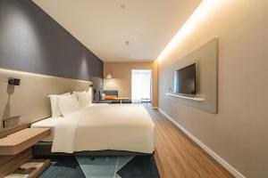 上海世博中心智选假日酒店客房内的一张或多张床位