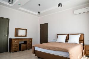 Park-Hotel Vishnevaya Gora客房内的一张或多张床位