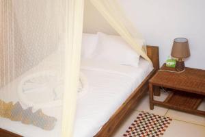 Remarkable 10-Bed Cottages in Bagamoyo客房内的一张或多张床位