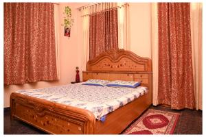 Sohana's Homestays - Work Friendly Apartment near Jaipur International Airport客房内的一张或多张床位