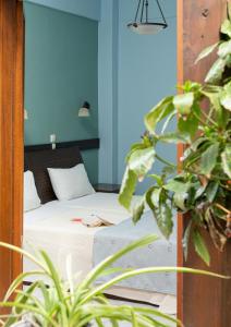 季莫斯塞尼斯酒店客房内的一张或多张床位