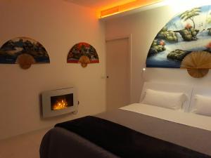 Villa Luxury Paradise Suites客房内的一张或多张床位