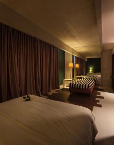 罗坎达德尔贝纳科酒店客房内的一张或多张床位