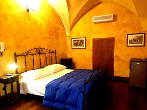 内尔特罗斯托里科酒店客房内的一张或多张床位