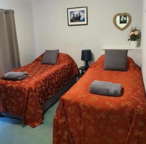Stansted Lodge Guest House客房内的一张或多张床位