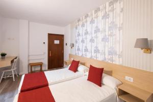 Hotel Apartamentos Villa Gomera客房内的一张或多张床位