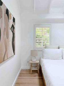 Casa Parker Stunning 3bdrm apartment in Killcare客房内的一张或多张床位