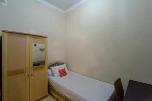 KoolKost Syariah At Komplek PLN Balikpapan客房内的一张或多张床位