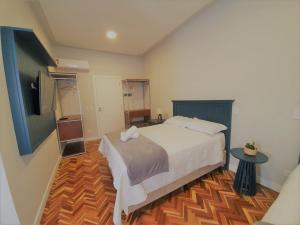 Paranaguá Lodge客房内的一张或多张床位