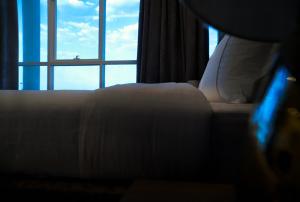فندق راديانس جراند客房内的一张或多张床位