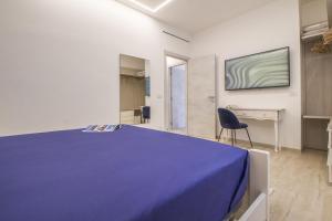 Primopiano Luxury Accommodations客房内的一张或多张床位