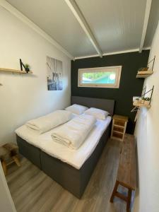 Casa 2234 op camping de Schatberg客房内的一张或多张床位