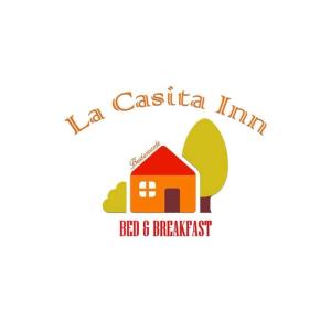 BustamanteLa Casita Inn Bustamante的房屋房地产公司的标志