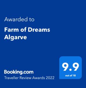 阿尔曼萨Farm of Dreams Algarve的写有文本的蓝色标志授予梦幻农场年鉴