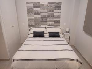Apartamento Madrid Norte客房内的一张或多张床位