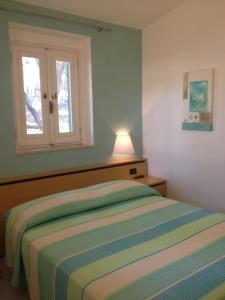 维拉奇奥国际彭塔代尔蒙特假日公园客房内的一张或多张床位
