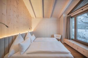 Chalet Alpspitze - Riverside客房内的一张或多张床位