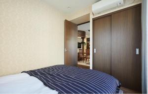 Kyodo Private House客房内的一张或多张床位