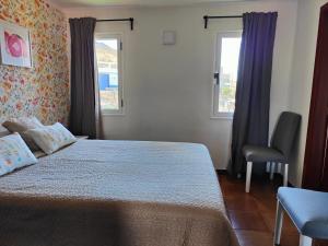 拉霍利亚旅舍 - 拉阿尔迪客房内的一张或多张床位