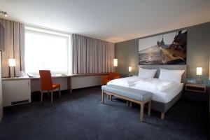 Nordsee Hotel City客房内的一张或多张床位