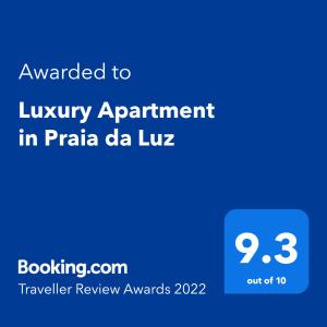 卢斯Luxury Apartment in Praia da Luz的普拉亚豪华公寓的手机短信