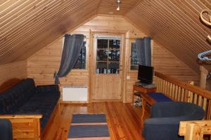 Sininen Hetki Cottage的休息区