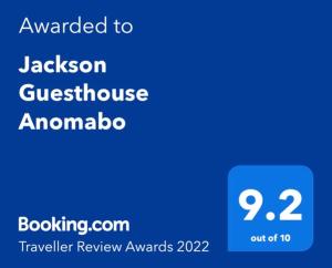 AnomabuJackson Guesthouse Anomabo的手机的屏幕,短信被授予杰克森吉布森威克