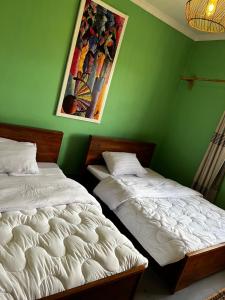 City Retreat Arusha客房内的一张或多张床位