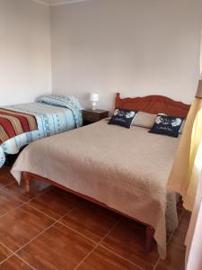Alto Noa San Pedro de Atacama客房内的一张或多张床位