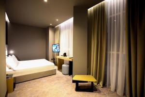 The Central View Boutique Hotel客房内的一张或多张床位