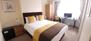 Hampton Lodge En-Suite Rooms with Free Parking客房内的一张或多张床位