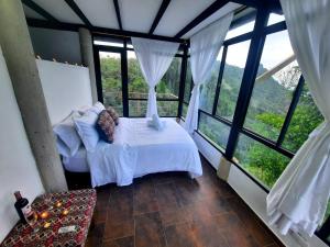 El paraíso de Butulu客房内的一张或多张床位
