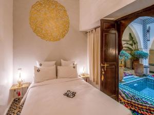 Riad Art & Emotions Boutique Hotel & Spa客房内的一张或多张床位