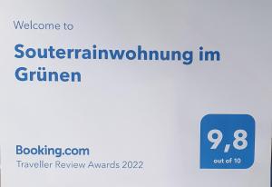 维滕Souterrainwohnung im Grünen的读取南风的标志的屏幕m a griner