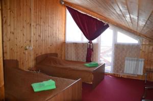 Дом Гавань Байкала客房内的一张或多张床位