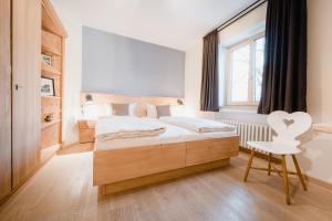 巴伐利亚生态酒店客房内的一张或多张床位