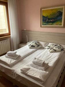 Adriatico Rooms客房内的一张或多张床位