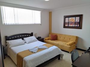 Hotel San Jeronimo客房内的一张或多张床位