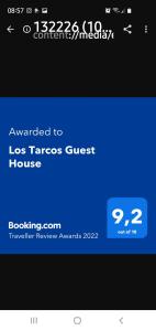 圣萨尔瓦多德朱Los Tarcos Guest House的电话屏幕的截图,有广告,