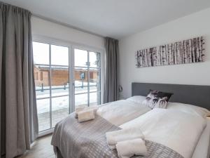 Lavish Apartment in Salzburgerland near Ski Area客房内的一张或多张床位