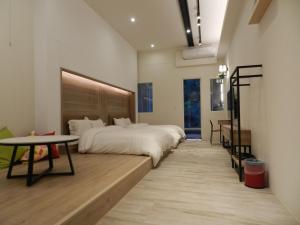 谷關明高溫泉 Mingao Hot Spring Resort客房内的一张或多张床位