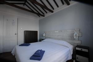 Casa BuonVento客房内的一张或多张床位