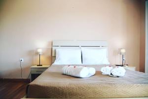 Spyridoula Resort Hotel in Corfu客房内的一张或多张床位