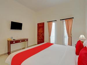 The Bingin Sari Jimbaran客房内的一张或多张床位