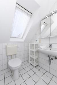 Hotel-Pension Janssen - Gästehaus Huus an't Deep的一间浴室