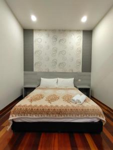 Jawa Townstay客房内的一张或多张床位