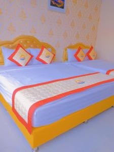 Khách sạn Sunrise Ninh Thuận客房内的一张或多张床位