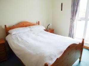Colbha Cottage客房内的一张或多张床位